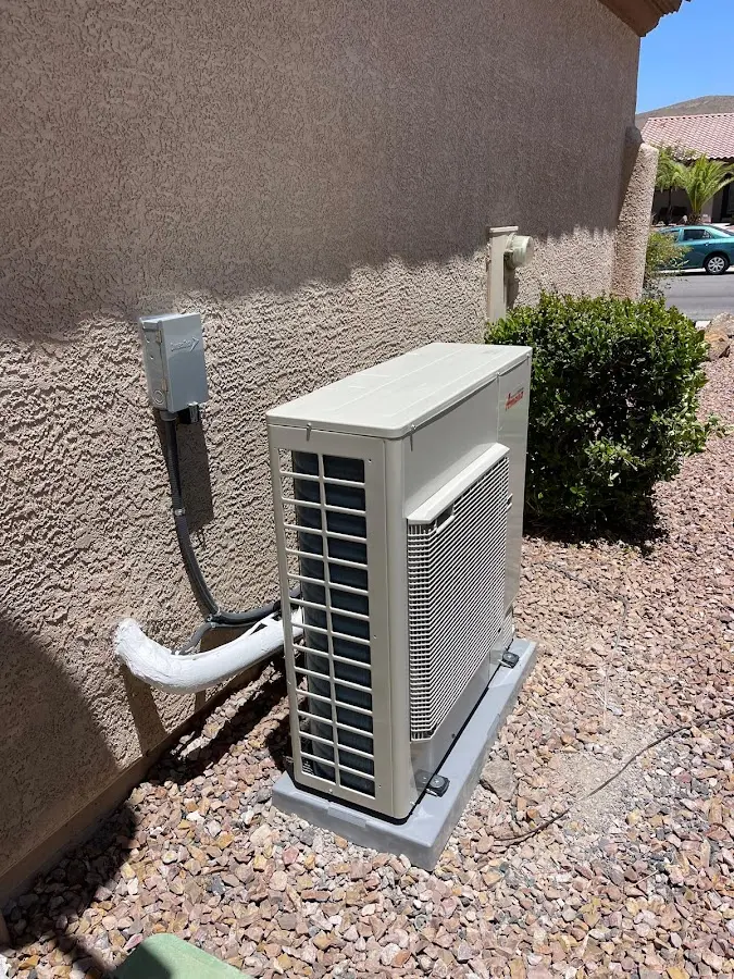 Residential air conditioning condenser unit in Lyndon